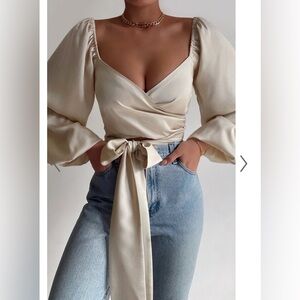 Showpo TOREE TOP - LONG SLEEVE WRAP TOP IN CREAM